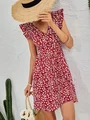 Vestido floral de espalda abierta con lazo fruncido