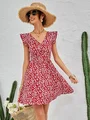 Vestido floral de espalda abierta con lazo fruncido
