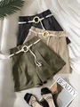 short con cinturon de aro